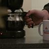 All Liquids Piping B.V. logo on a coffee mug, part of a PuraVideos brand film showcasing expertise in piping systems, industrial hoses and temporary installations