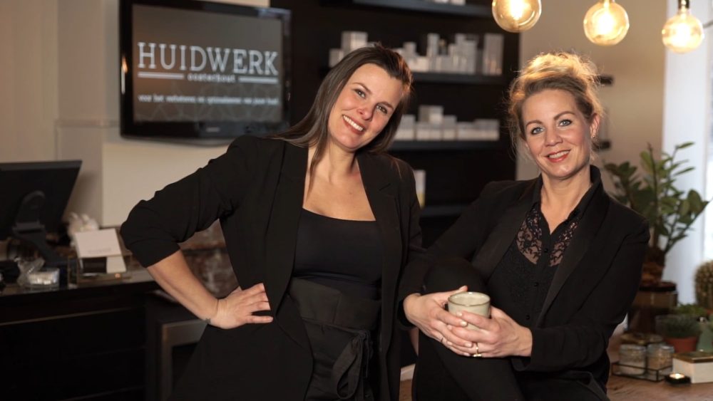 Two owners of Huidwerk skincare and beauty salon, featured in a PuraVideos company video highlighting pedicure, skin treatments, and professional salon care